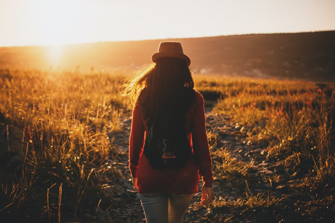 standing girl with backpack